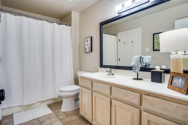 101 Eagle Pt, Graford, TX 76449 - bathroom featuring stone finish flooring, toilet, and vanity