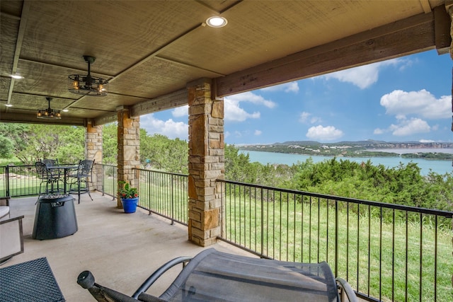 101 Eagle Pt, Graford, TX 76449 - view of patio with a water view and a balcony