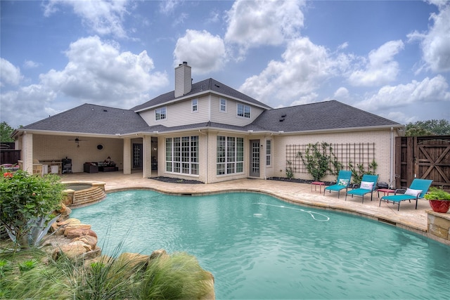 1116 Squaw Vly, Rockwall, TX 75087 - view of swimming pool featuring a patio area, a ceiling fan, and a pool with connected hot tub