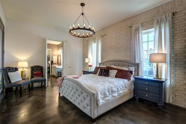 1116 Squaw Vly, Rockwall, TX 75087 - bedroom featuring a chandelier, finished concrete floors, brick wall, and ensuite bathroom