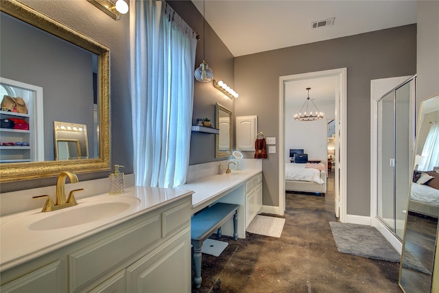 1116 Squaw Vly, Rockwall, TX 75087 - ensuite bathroom with concrete floors, a stall shower, vanity, and a chandelier