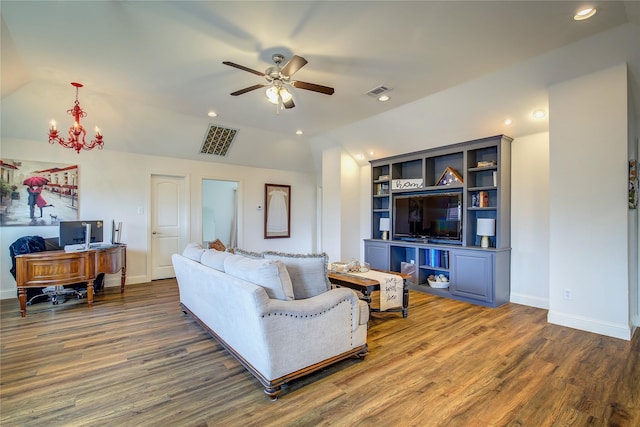 1116 Squaw Vly, Rockwall, TX 75087 - living area featuring wood finished floors, a chandelier, vaulted ceiling, ceiling fan, and baseboards