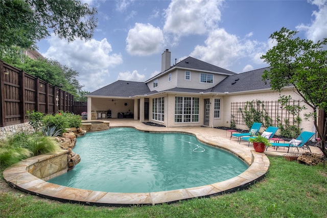 1116 Squaw Vly, Rockwall, TX 75087 - view of swimming pool featuring a patio, a fenced backyard, and a pool with connected hot tub