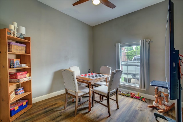 1116 Squaw Vly, Rockwall, TX 75087 - dining room featuring baseboards, wood finished floors, and a ceiling fan