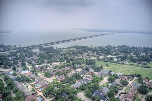 1116 Squaw Vly, Rockwall, TX 75087 - aerial perspective of suburban area with a large body of water and a notable bridge