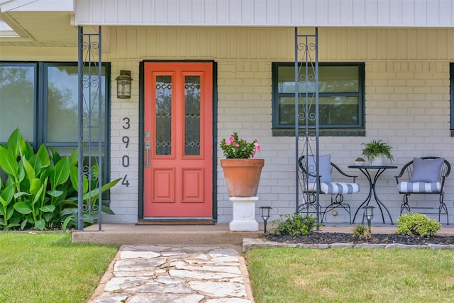 3904 Crescent Dr, De Cordova, TX 76049 - view of exterior entry with covered porch and brick siding