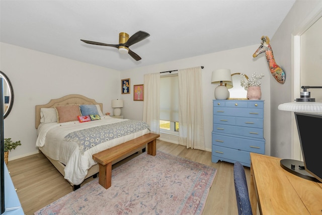 3904 Crescent Dr, De Cordova, TX 76049 - bedroom with wood finished floors, ceiling fan, and baseboards