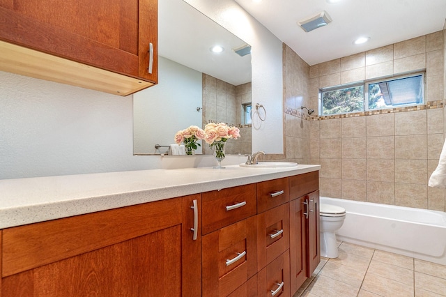 8830 Boundbrook Ave, Dallas, TX 75243 - bathroom featuring tile patterned floors, vanity, toilet,  shower combination, and recessed lighting