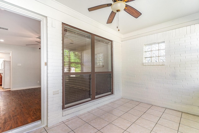 8830 Boundbrook Ave, Dallas, TX 75243 - empty room featuring ceiling fan, wood finished floors, and baseboards