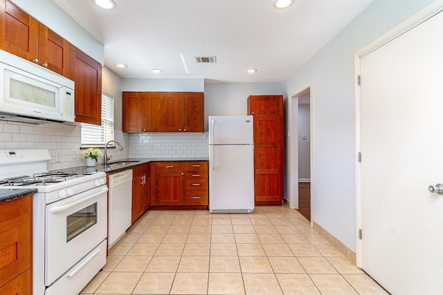 8830 Boundbrook Ave, Dallas, TX 75243 - kitchen featuring white appliances, a sink, backsplash, recessed lighting, and light tile patterned flooring