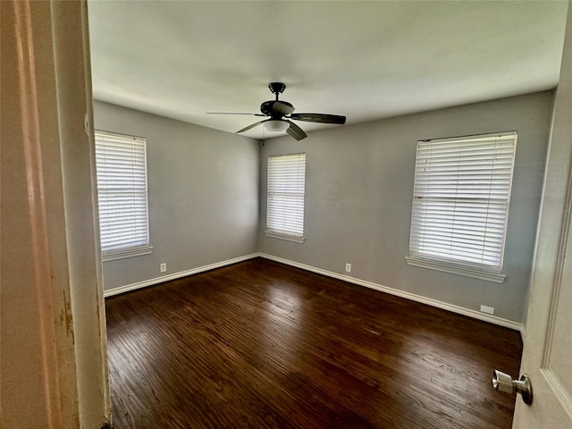 2952 Eric Ln, Farmers Branch, TX 75234 - spare room featuring wood finished floors, baseboards, and ceiling fan