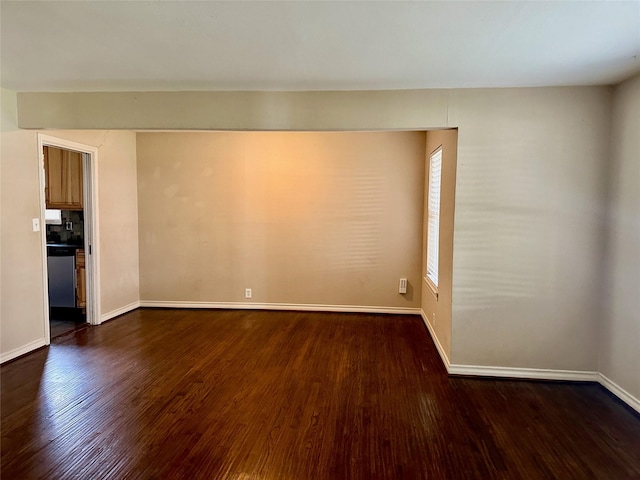 2952 Eric Ln, Farmers Branch, TX 75234 - spare room with dark wood finished floors and baseboards