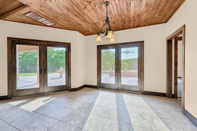 5300 Highland Dr, Denison, TX 75020 - doorway with french doors, wood ceiling, baseboards, and a chandelier