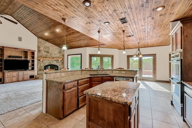 5300 Highland Dr, Denison, TX 75020 - kitchen featuring a sink, a large island, stainless steel appliances, wooden ceiling, and plenty of natural light