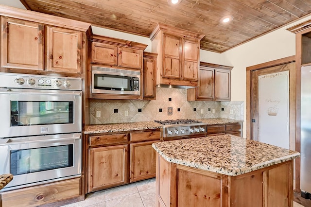 5300 Highland Dr, Denison, TX 75020 - kitchen featuring stainless steel appliances, wooden ceiling, light stone counters, backsplash, and light tile patterned flooring