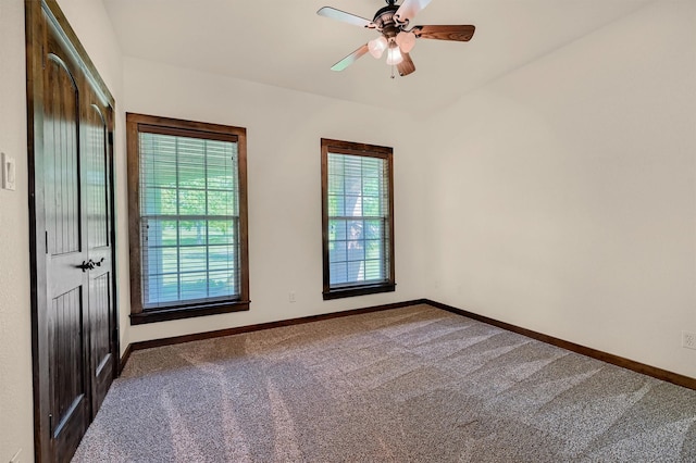 5300 Highland Dr, Denison, TX 75020 - unfurnished room with carpet floors, baseboards, and ceiling fan