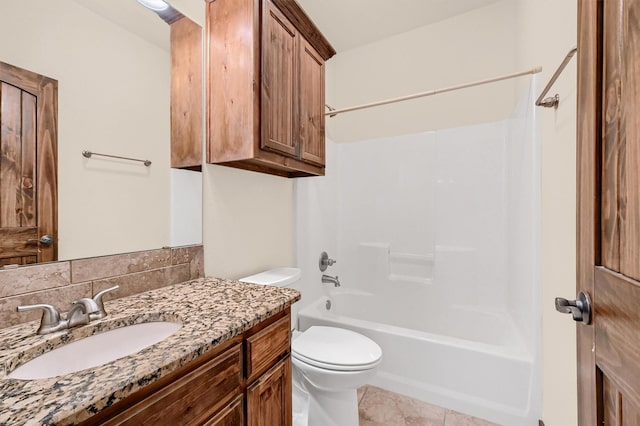 5300 Highland Dr, Denison, TX 75020 - full bathroom featuring toilet, vanity, and bathtub / shower combination
