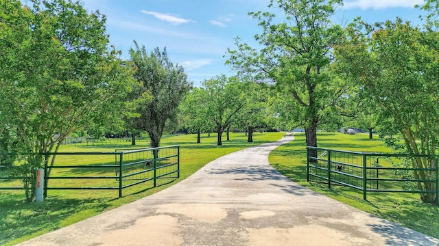 5300 Highland Dr, Denison, TX 75020 - view of property's community featuring a gate and driveway
