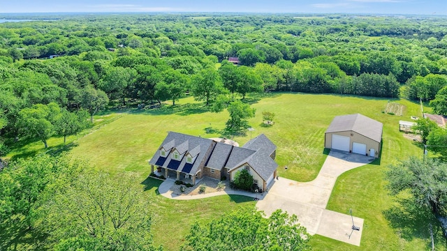 5300 Highland Dr, Denison, TX 75020 - view of subject property with a forest