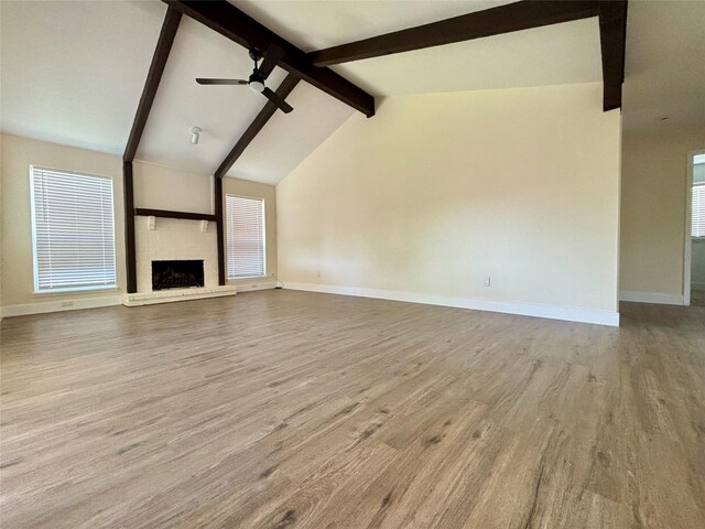 1153 Tracy Ln, Lancaster, TX 75134 - unfurnished living room with baseboards, wood finished floors, and a fireplace