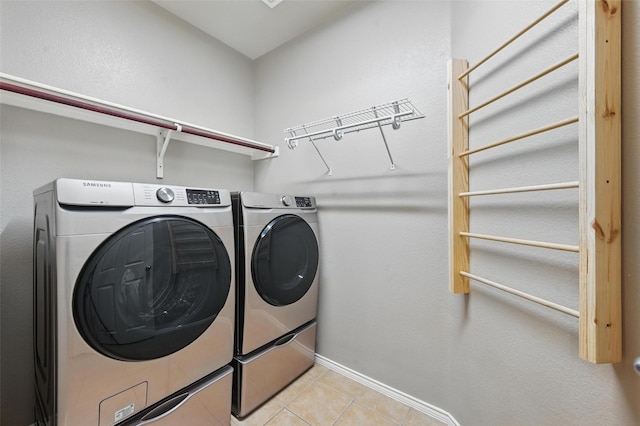 2020 Childress Dr, Forney, TX 75126 - washroom with washing machine and dryer, light tile patterned floors, and baseboards
