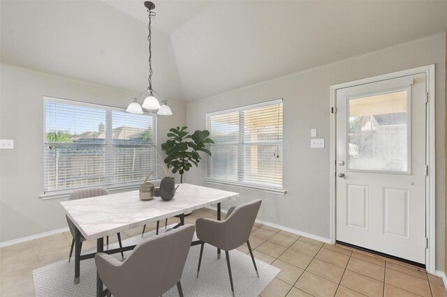 2020 Childress Dr, Forney, TX 75126 - dining room featuring vaulted ceiling, light tile patterned floors, and baseboards