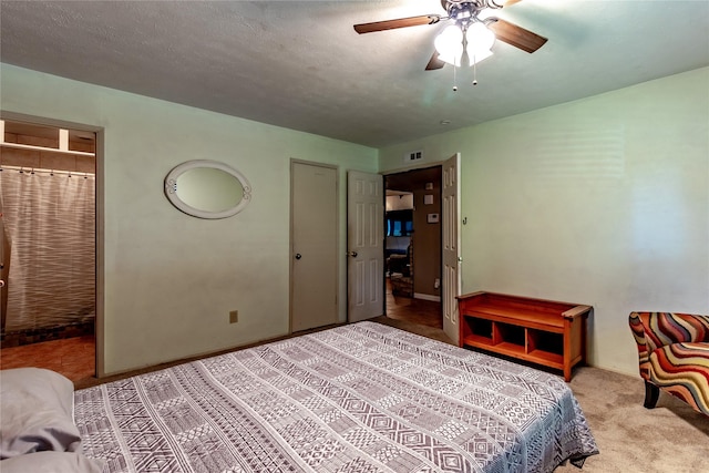 2606 Cedar Elm Ln, Garland, TX 75043 - carpeted bedroom featuring ceiling fan
