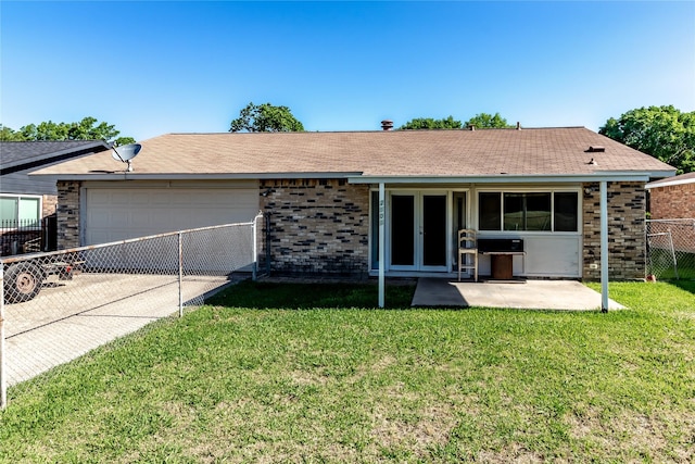 2606 Cedar Elm Ln, Garland, TX 75043 - ranch-style home with a garage, brick siding, french doors, and concrete driveway