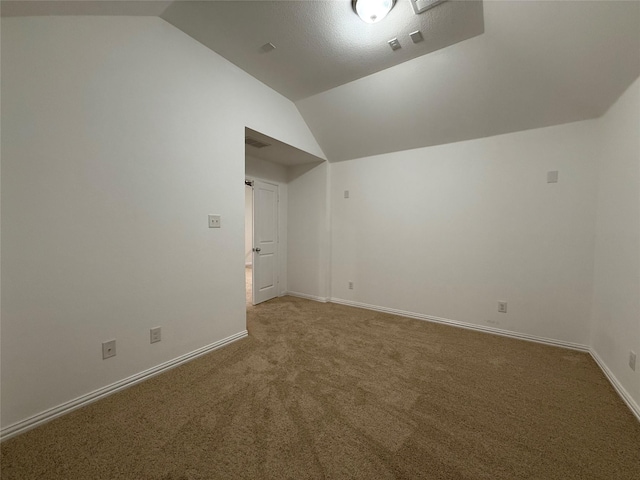 1103 Bantham Way, Forney, TX 75126 - additional living space with vaulted ceiling, carpet floors, and baseboards