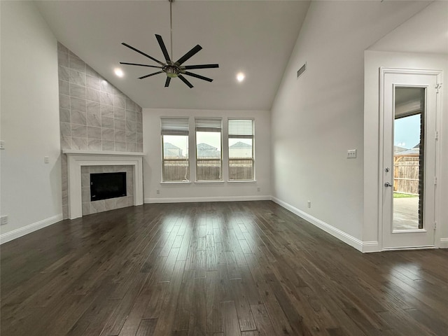 1103 Bantham Way, Forney, TX 75126 - unfurnished living room featuring vaulted ceiling, ceiling fan, dark wood finished floors, a fireplace, and baseboards