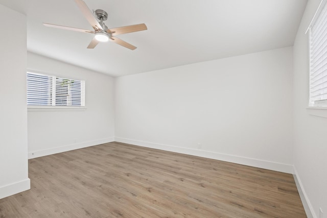 607 W Sears St, Denison, TX 75020 - unfurnished room with light wood finished floors, a ceiling fan, and baseboards