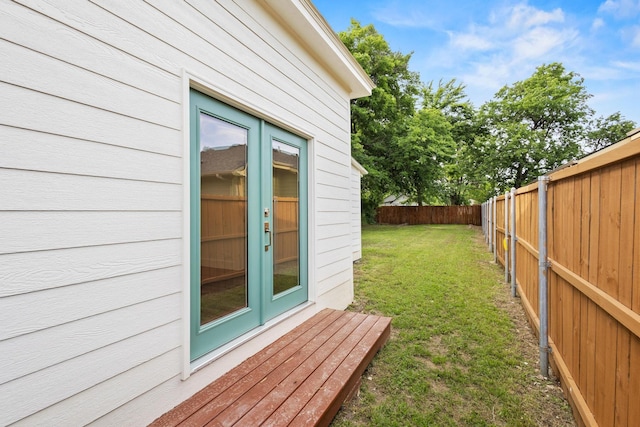 607 W Sears St, Denison, TX 75020 - view of yard featuring french doors