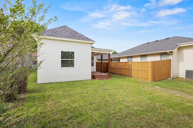 607 W Sears St, Denison, TX 75020 - rear view of property with a shingled roof