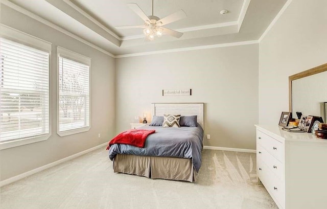 1926 N Stodghill Rd, Rockwall, TX 75087 - bedroom with a tray ceiling, light carpet, baseboards, ornamental molding, and a ceiling fan