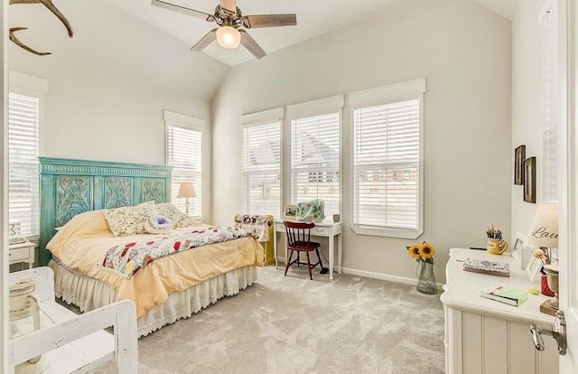 1926 N Stodghill Rd, Rockwall, TX 75087 - bedroom with vaulted ceiling, light colored carpet, baseboards, and a ceiling fan
