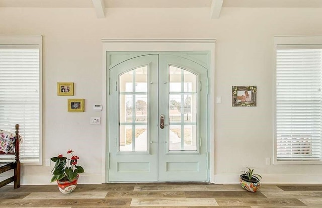1926 N Stodghill Rd, Rockwall, TX 75087 - doorway with french doors, beamed ceiling, and wood finished floors