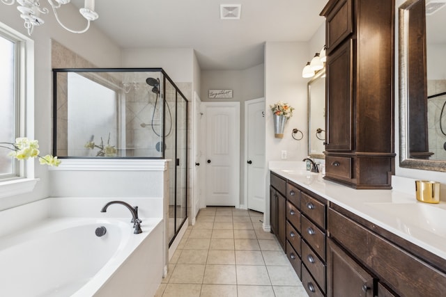 7745 Northumberland Dr, Fort Worth, TX 76179 - full bath featuring a shower stall, a bath, tile patterned flooring, and double vanity