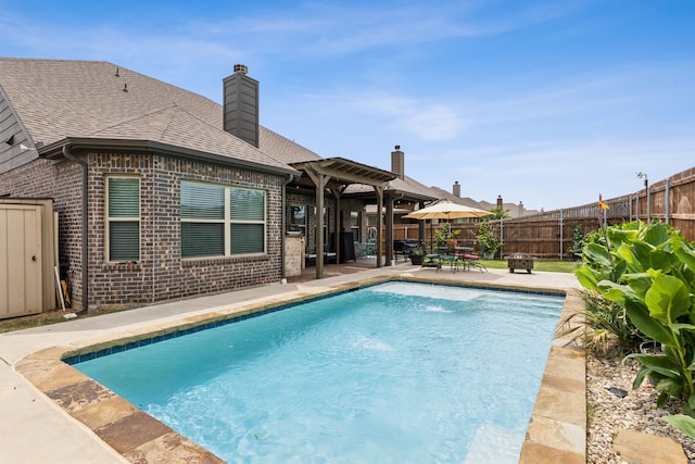 7745 Northumberland Dr, Fort Worth, TX 76179 - view of swimming pool with a patio area, a fenced backyard, and a pergola