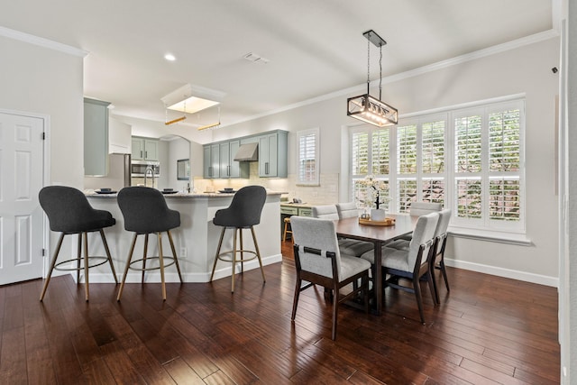 1531 Redeemer Rd, Allen, TX 75002 - dining room with ornamental molding, healthy amount of natural light, dark wood finished floors, baseboards, and recessed lighting