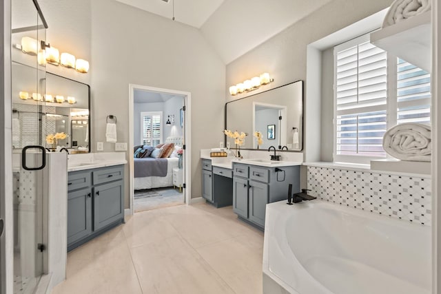 1531 Redeemer Rd, Allen, TX 75002 - ensuite bathroom featuring a stall shower, a garden tub, tile patterned floors, vaulted ceiling, and vanity
