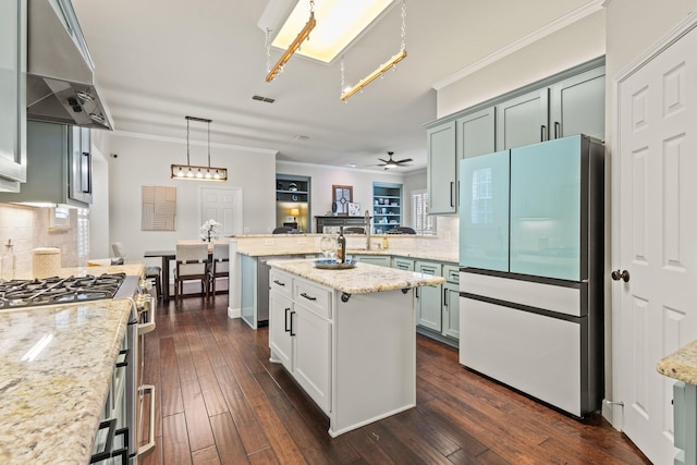 1531 Redeemer Rd, Allen, TX 75002 - kitchen featuring freestanding refrigerator, stainless steel stove, ornamental molding, ventilation hood, and a peninsula