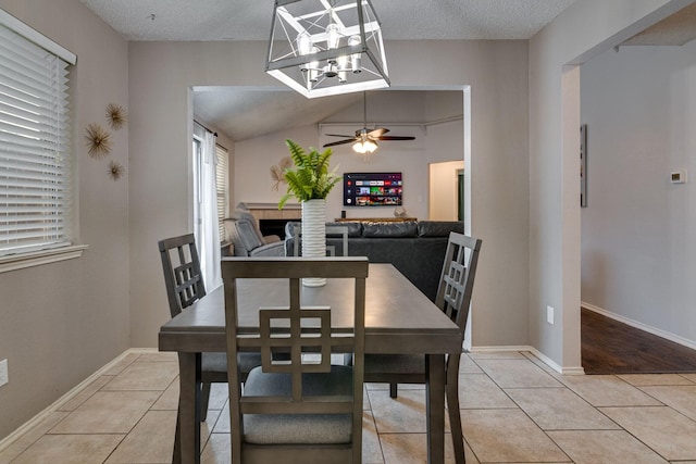 6713 Windwillow Dr, Fort Worth, TX 76137 - dining space with light tile patterned flooring, plenty of natural light, a ceiling fan, and a textured ceiling