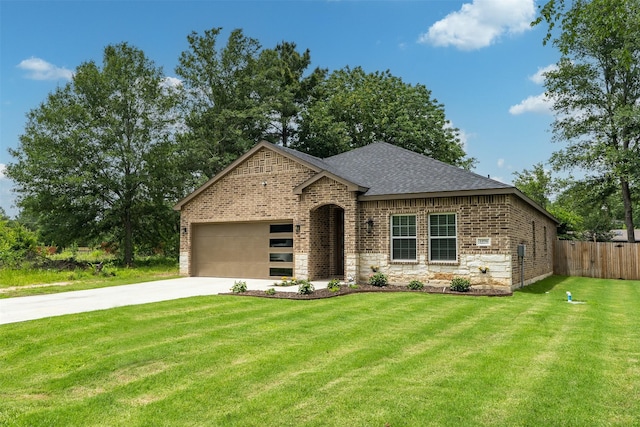 1096 Tupuna Ct, Tool, TX 75143 - view of front of home featuring brick siding, concrete driveway, an attached garage, and a shingled roof