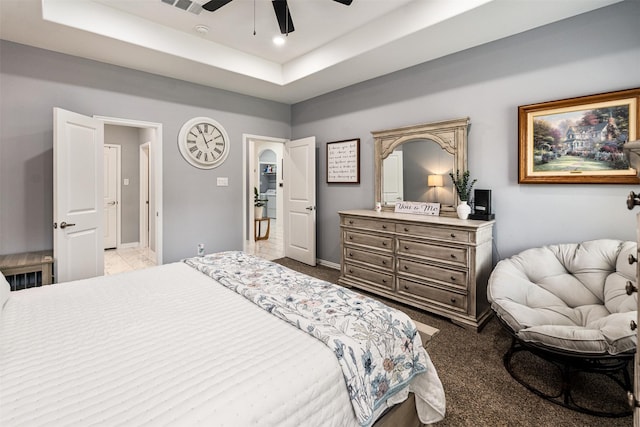 1096 Tupuna Ct, Tool, TX 75143 - carpeted bedroom featuring a tray ceiling, baseboards, ceiling fan, and recessed lighting