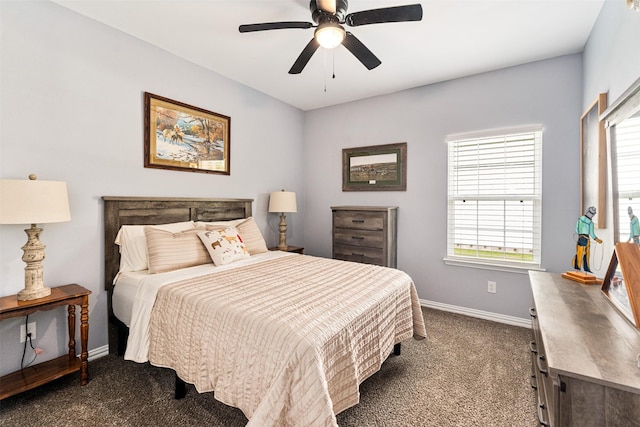 1096 Tupuna Ct, Tool, TX 75143 - bedroom with dark colored carpet, baseboards, multiple windows, and a ceiling fan