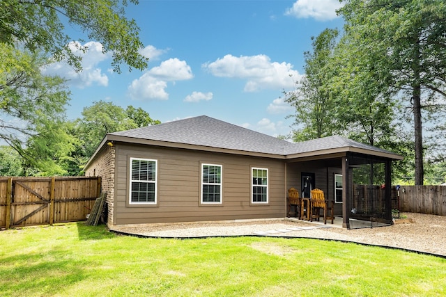 1096 Tupuna Ct, Tool, TX 75143 - rear view of house with a patio and a shingled roof