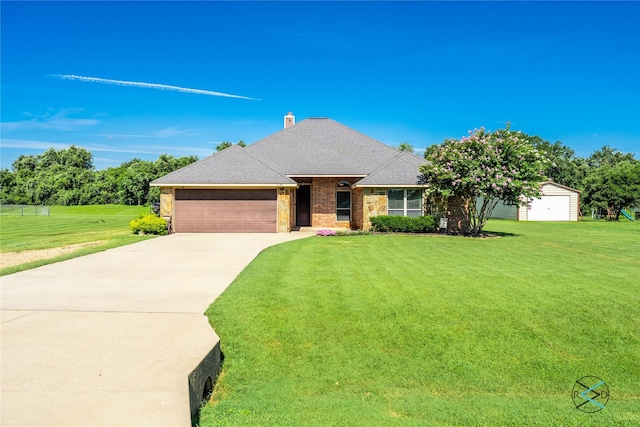 10195 Angie Ave, Eustace, TX 75124 - view of front of house with an attached garage, a front lawn, concrete driveway, and a chimney