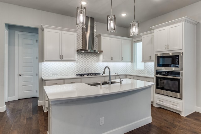 8230 Callimont Ln, Dallas, TX 75231 - kitchen featuring stainless steel oven, a sink, wall chimney exhaust hood, built in microwave, and light countertops