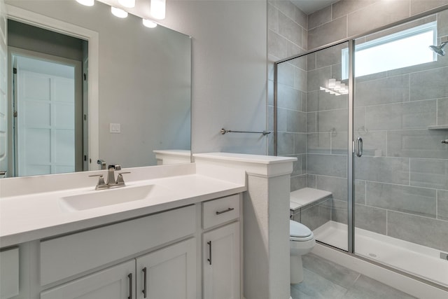 8230 Callimont Ln, Dallas, TX 75231 - full bathroom with toilet, a stall shower, tile patterned floors, and vanity
