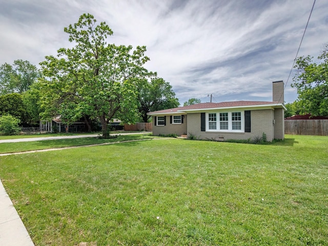 1803 4th St, Brownwood, TX 76801 - single story home featuring a chimney and brick siding